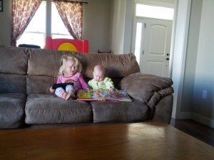 My two little girls with their book and tablet. Millie is really getting big. It's always crazy to me when they start doing big kid things.
